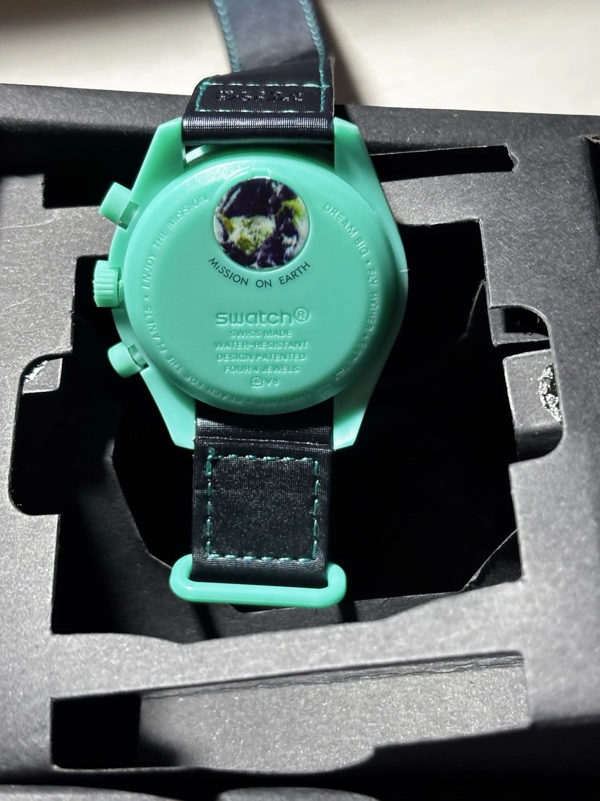 MOONSWATCH MISSION ON EARTH POLAR LIGHTS - SWATCH X OMEGA BIOCERAMIC