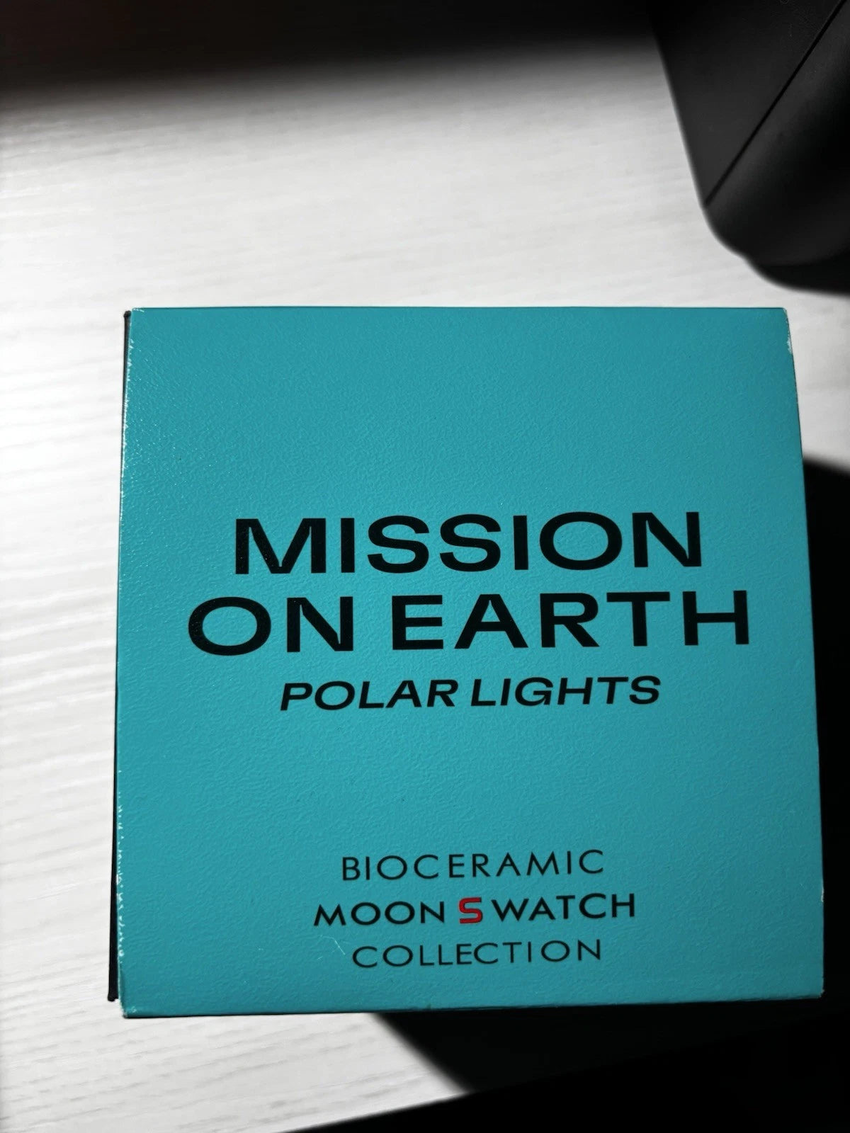 MOONSWATCH MISSION ON EARTH POLAR LIGHTS - SWATCH X OMEGA BIOCERAMIC