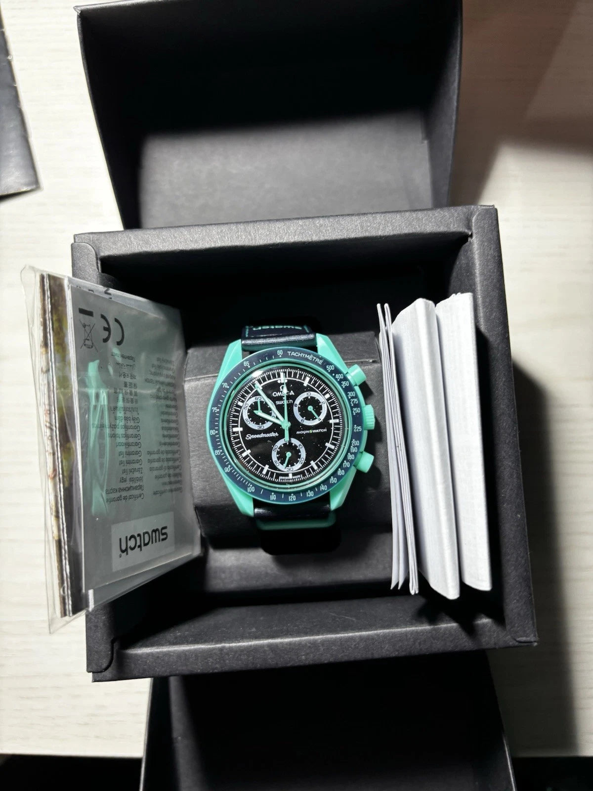 MOONSWATCH MISSION ON EARTH POLAR LIGHTS - SWATCH X OMEGA BIOCERAMIC